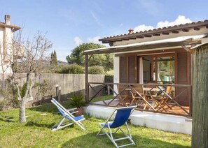 Terrace/patio - Perone, two-room apartment in a villa in Marina di Campo, with equipped garden, covered parking spac (Campo nell'Elba)