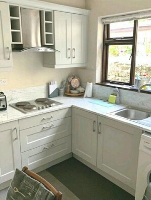 House, Multiple Beds | Private kitchen