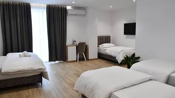 Phòng dành cho gia đình, quang cảnh biển | Bộ trải giường, có lối đi dành cho xe lăn