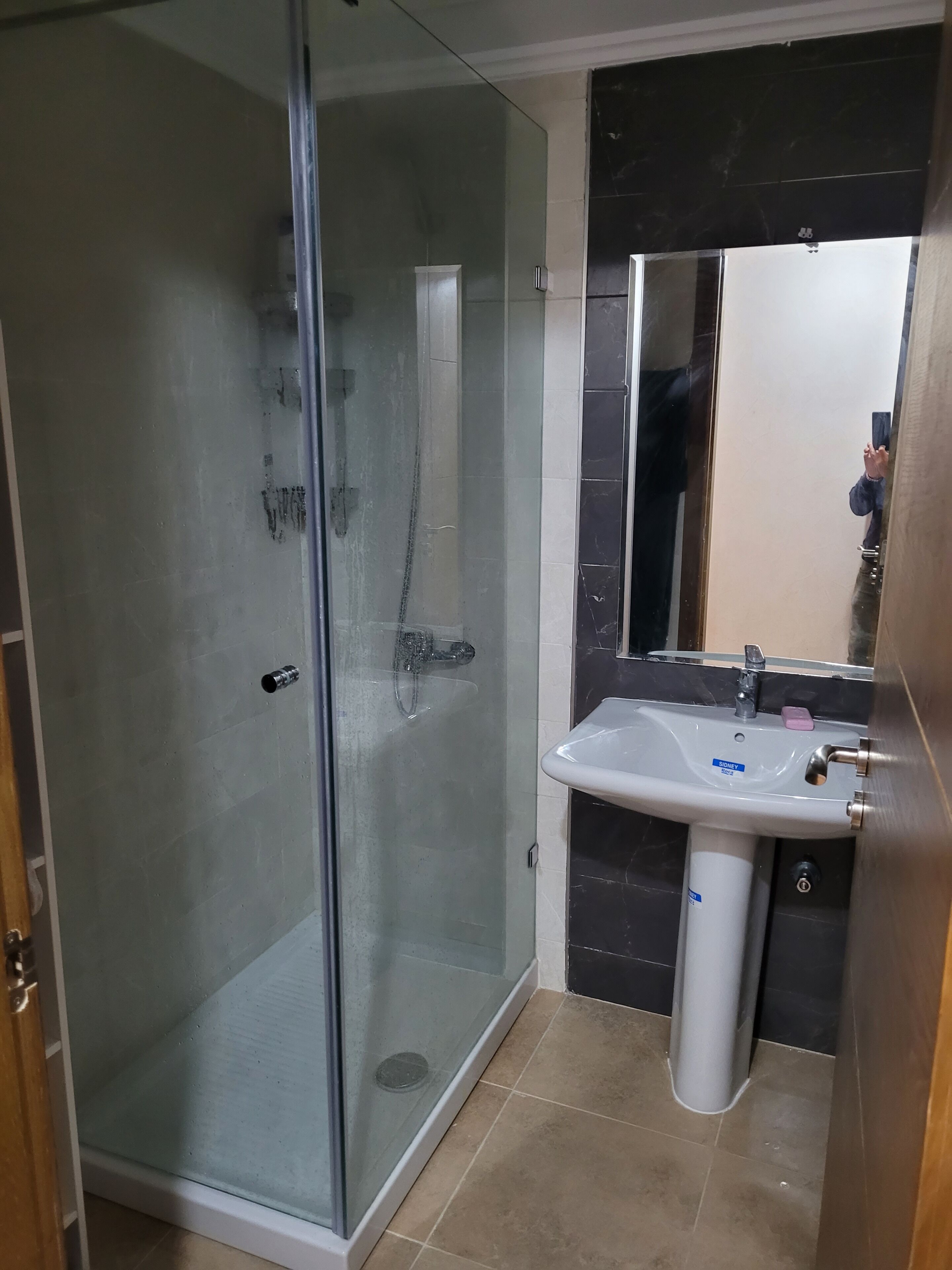 Shower, towels, soap, toilet paper
