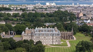 A large, historic building with a symmetrical facade, surrounded by lush greenery and a well-maintained lawn. - The Brewers Rooms Contemporary Aparthotel (Edinburgh)