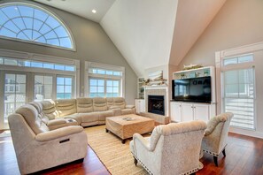 TV connectée, cheminée, jeux vidéo, lecteur de DVD