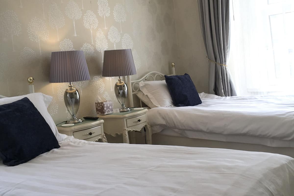 Twin Room, 1 Bedroom | Individually decorated, individually furnished, iron/ironing board