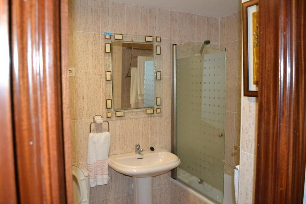 Gratis toiletartikelen, een haardroger, badjassen, pantoffels