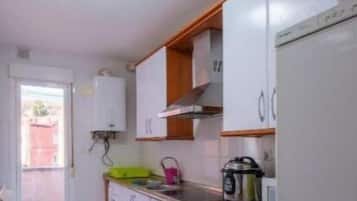 Frigorífic, forn, bullidora elèctrica i torradora