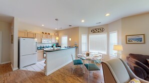 Enjoy a comfortable stay in this stylish apartment with a central kitchen, dining area, and cozy living space.