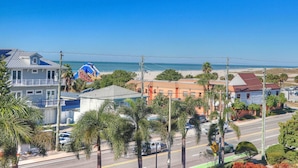 A coastal town with a beach, houses, and a water slide. - Beach Views, Steps to the Beach Access. Waterfront Resort Heated Pool & Hot Tub. Fishing Dock. (Treasure Island)