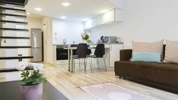Design Apartment | Living area | 37-inch LCD TV with cable channels, TV