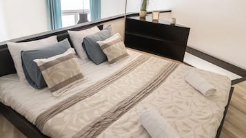 Design Apartment | 1 bedroom, blackout drapes, iron/ironing board, travel crib