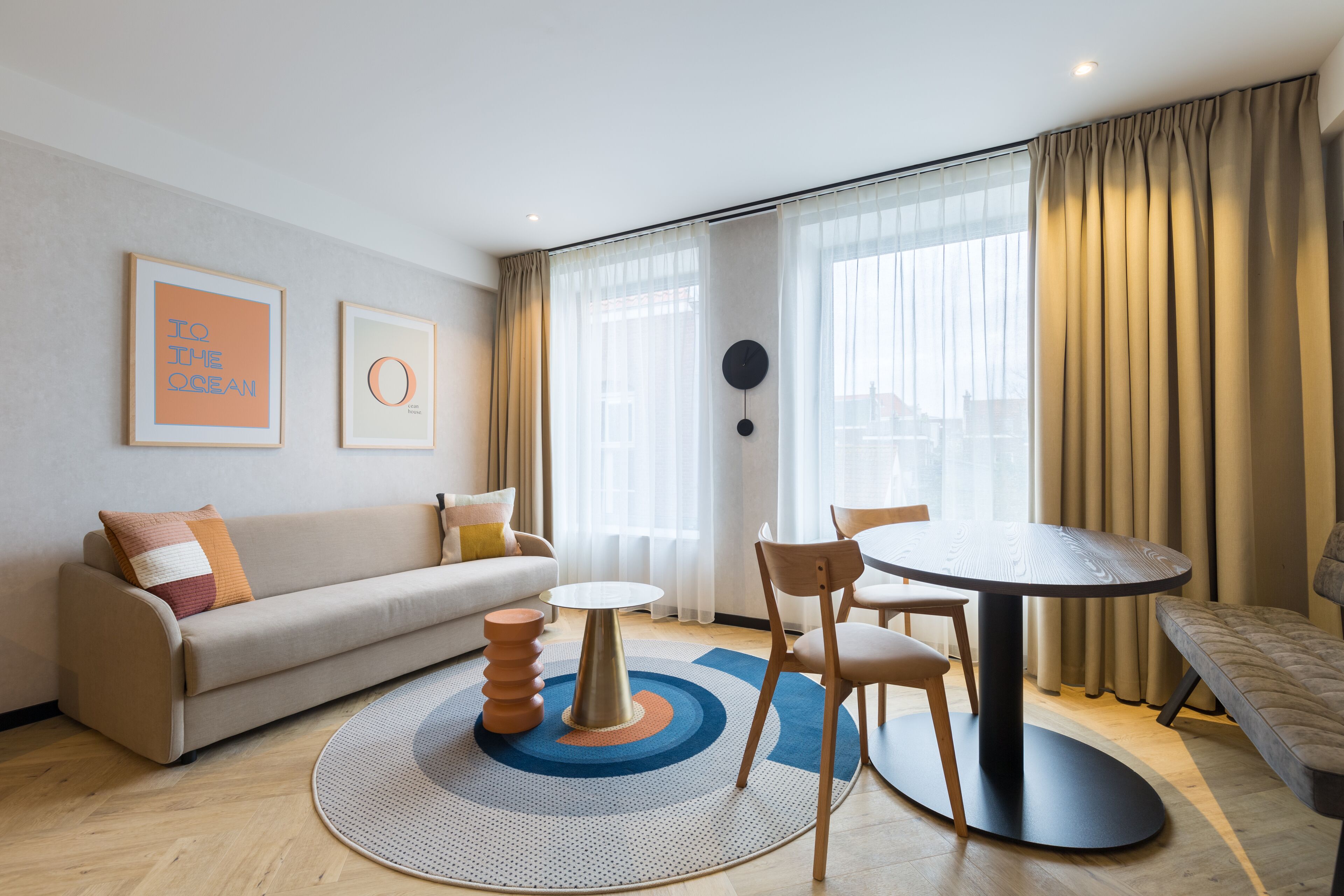 Hypo-allergenic bedding, desk, laptop workspace, blackout drapes