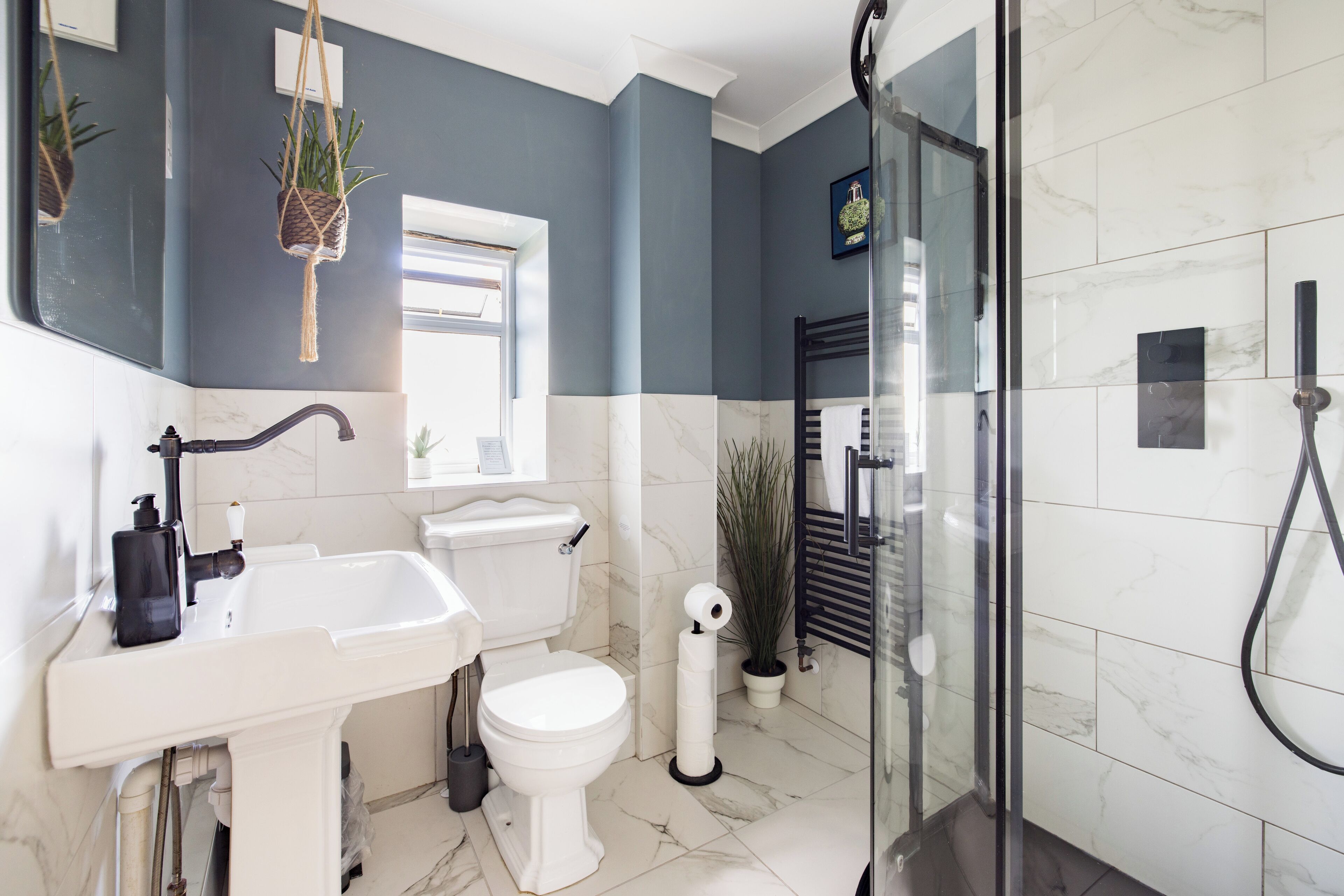 Bathtub, hair dryer, towels, soap