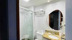 Basic Apartment | Bathroom | Shower, hair dryer, towels