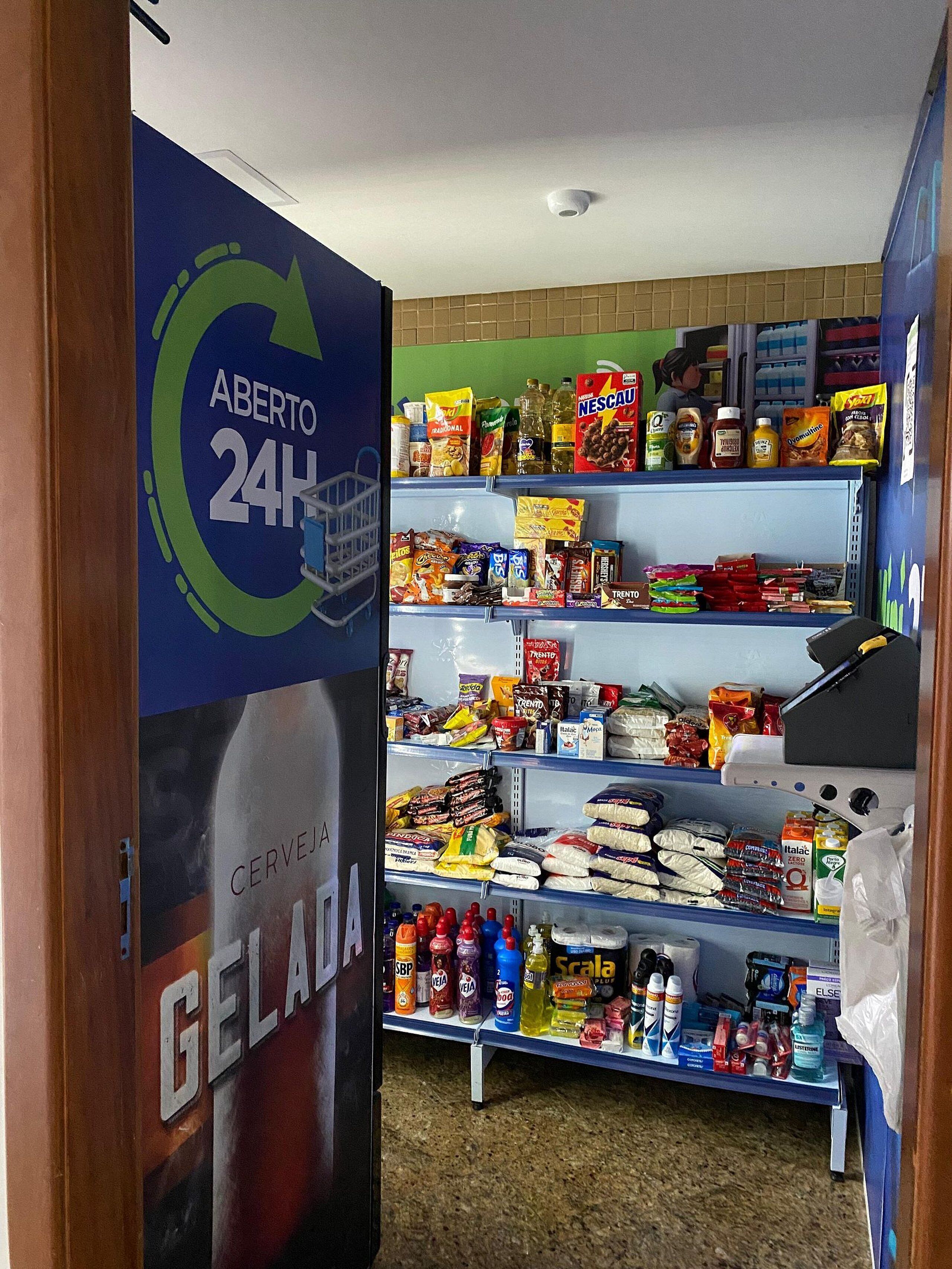 A 24-hour convenience store with shelves stocked with snacks, beverages, and household items.