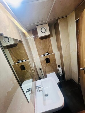 Shower, rainfall showerhead, towels