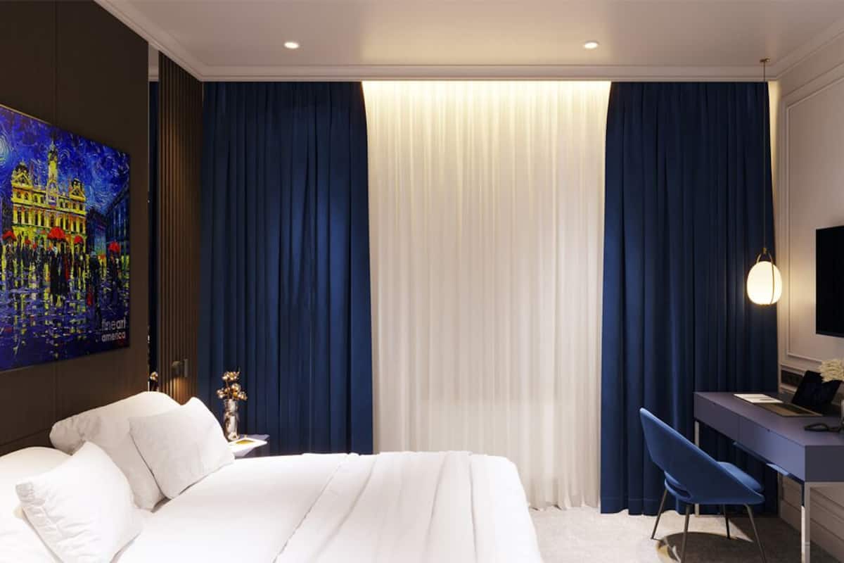 Economy kamer | Een minibar, een bureau, gratis wifi, beddengoed