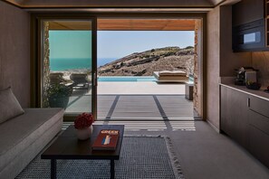 Retreat Suite with Private Heated Plunge Pool and Sea View | Living area | 40-inch Smart TV with satellite channels, TV, Netflix - Santorini Sky - The Retreat (Santorini)