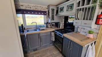 Rumah, Beberapa Tempat Tidur | Dapur pribadi | Lemari es, microwave, oven, dan kompor