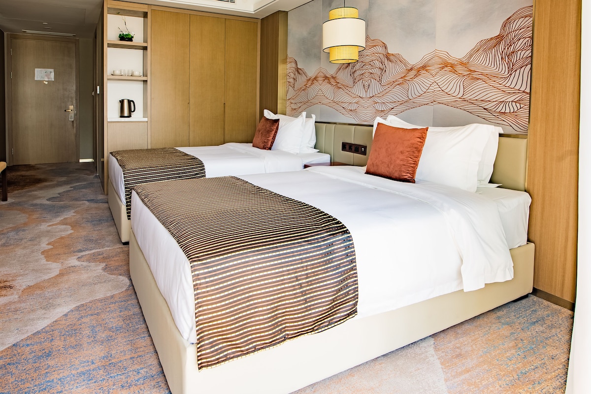 Ropa de cama de alta calidad y minibar 