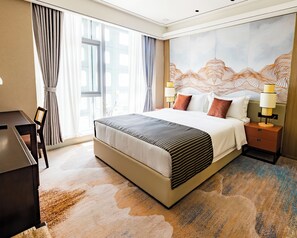 Ropa de cama de alta calidad y minibar 