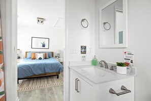 Combined shower/bathtub, hair dryer, towels, soap