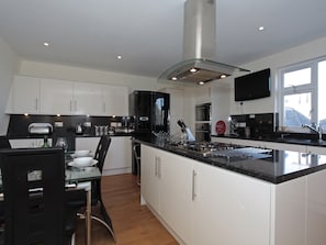 Dishwasher, highchair, cookware/dishes/utensils