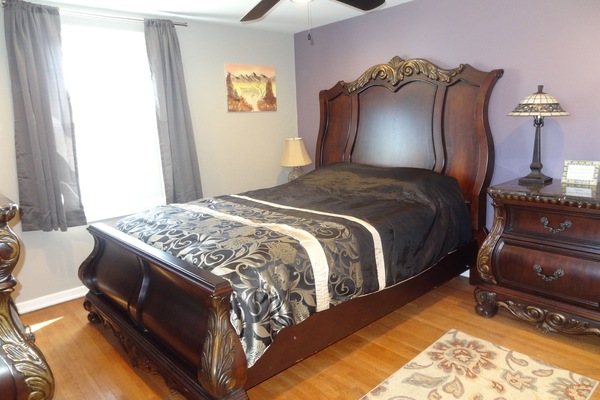 Master bedroom, queen bed, ceiling fan, full closet