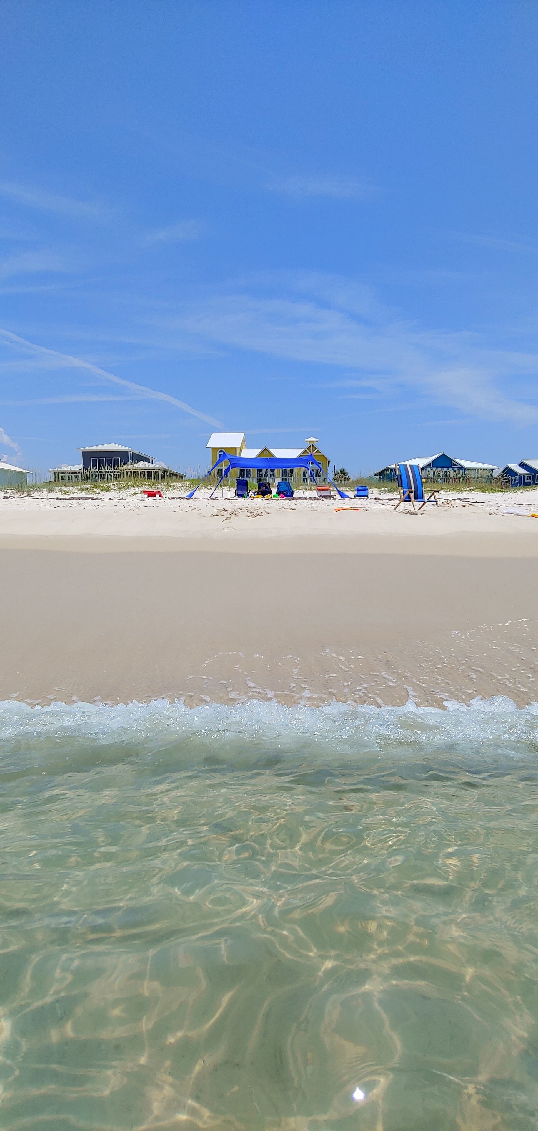 On the beach, sun-loungers