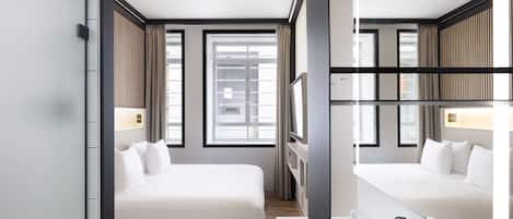 Roba de llit d'alta qualitat, minibar i caixa forta a l'habitació