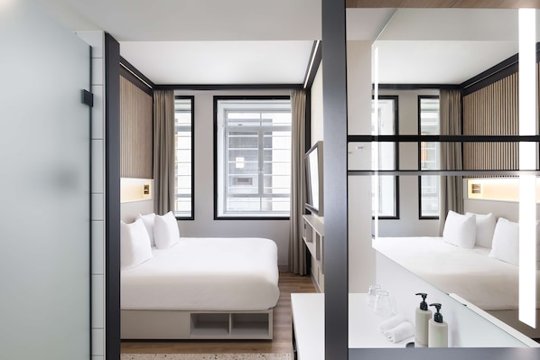 Ropa de cama de alta calidad y minibar