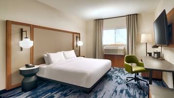 Desk, laptop workspace, blackout drapes, iron/ironing board