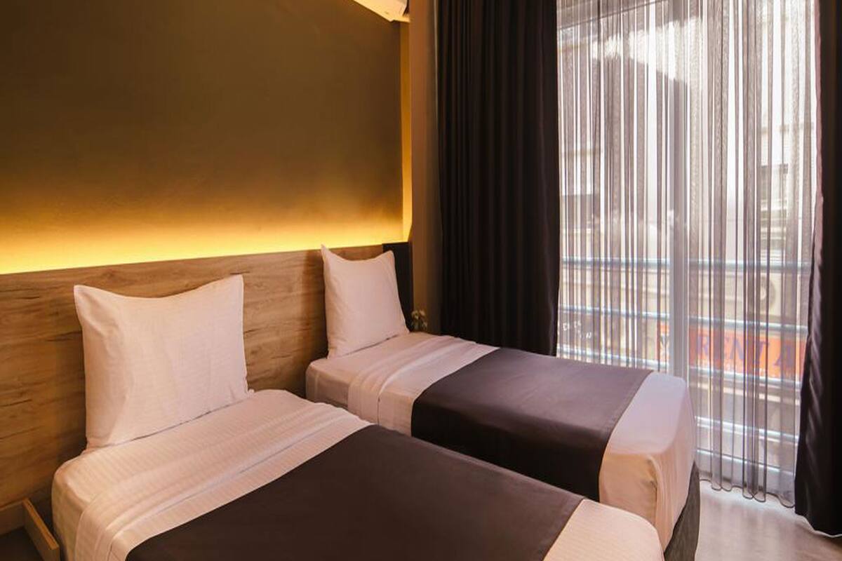 Roupas de cama premium, frigobar, Wi-Fi de cortesia, roupa de cama