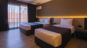 Standard Triple Room | Premium bedding, minibar, free WiFi, bed sheets