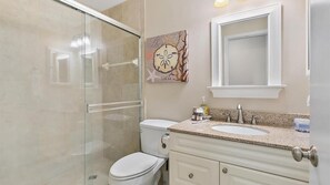 Combined shower/tub, hair dryer, towels, shampoo