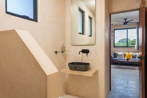 Shower, rainfall showerhead, hair dryer, towels