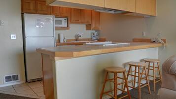 Condo, 1 King Bed with Sofa bed (Waters Edge 302) | Private kitchen