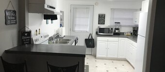 Large waterfront house on quiet canal of all-sport Eight Point Lake