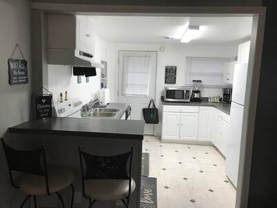 Large waterfront house on quiet canal of all-sport Eight Point Lake