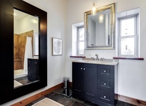 Combined shower/tub, hair dryer, towels, soap