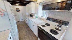 Ferienhaus, Mehrere Betten (Woodley Beach House) | Eigene Küche