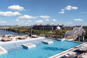 Outdoor pool, pool umbrellas, sun loungers