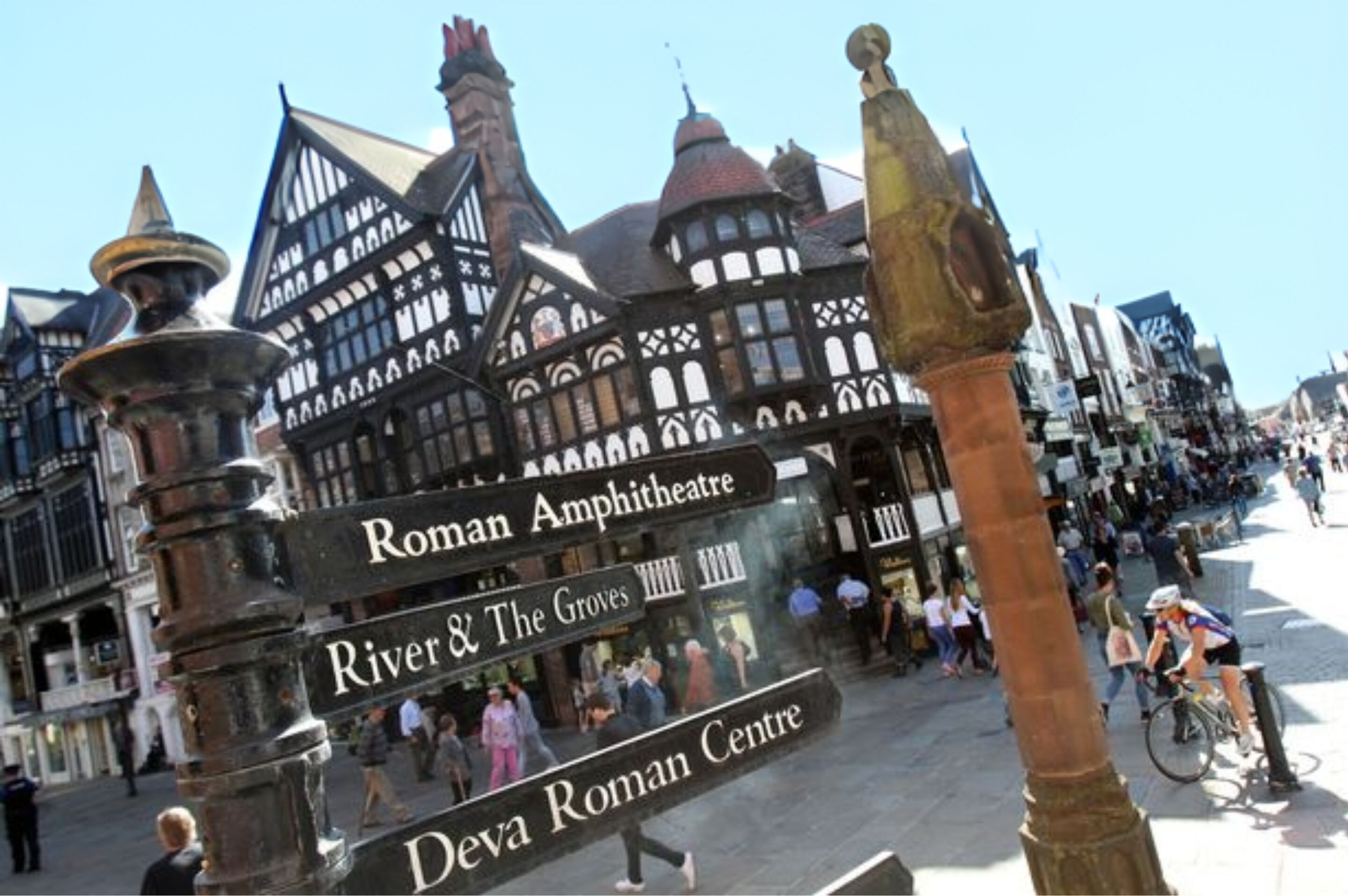 A historic building with a sign for the Roman Amphitheatre and Deva Roman Centre.