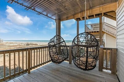 Luxury Beachfront Condo with Covered Deck Steps From Beach & Golf Cart Rental 