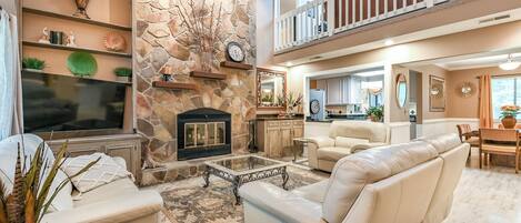 スマートテレビ、暖炉、卓球台、書庫