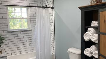 Combined shower/bathtub