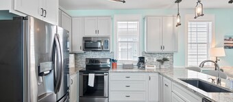 3 Master Bedrooms, + 1/2 bath, 2 Pools, Hot Tub, Screened Porches w/Swings