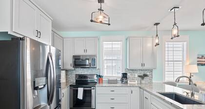 3 Master Bedrooms, + 1/2 bath, 2 Pools, Hot Tub, Screened Porches w/Swings