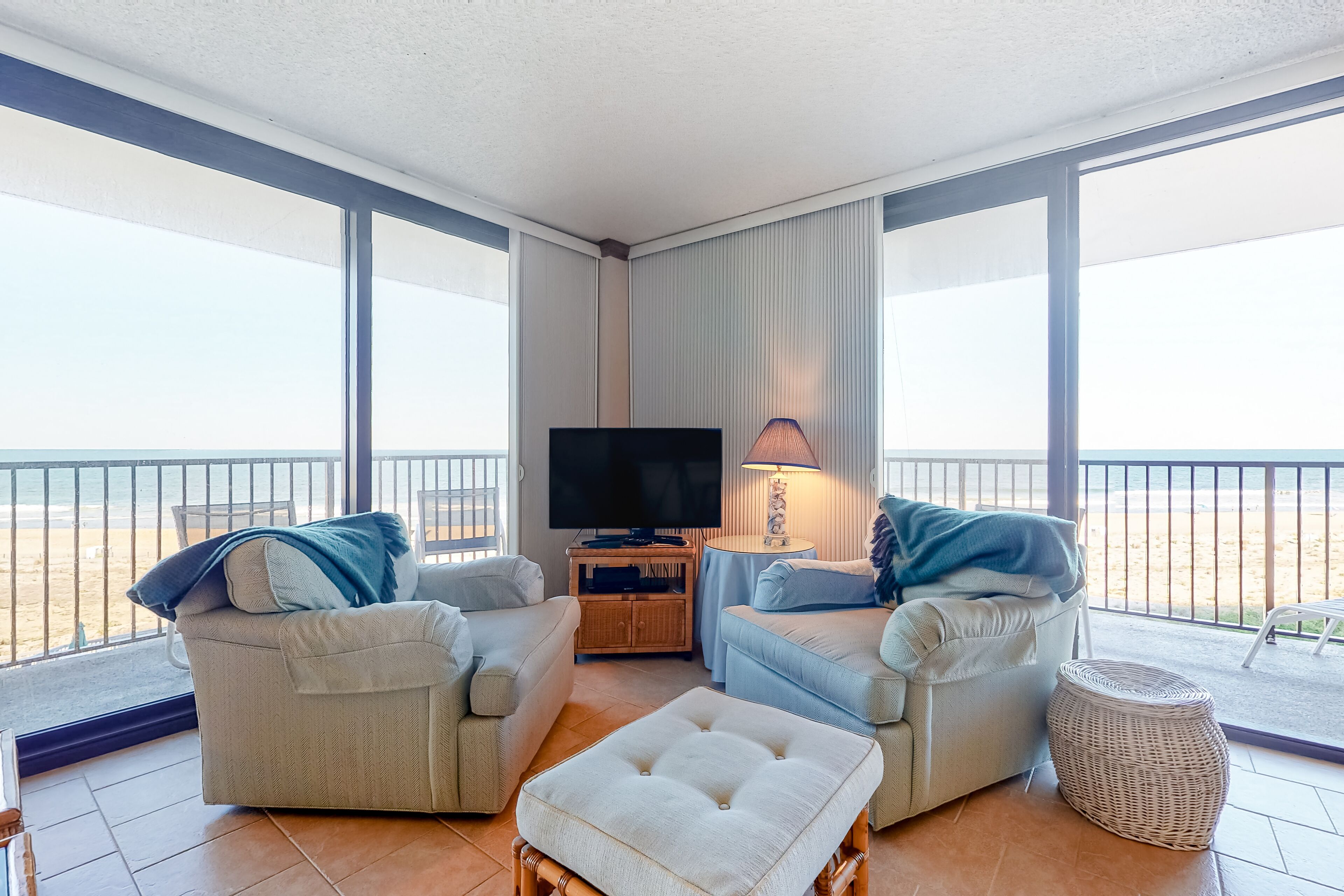 Sea Colony corner condo with ocean views, wraparound balcony, pools, & beach