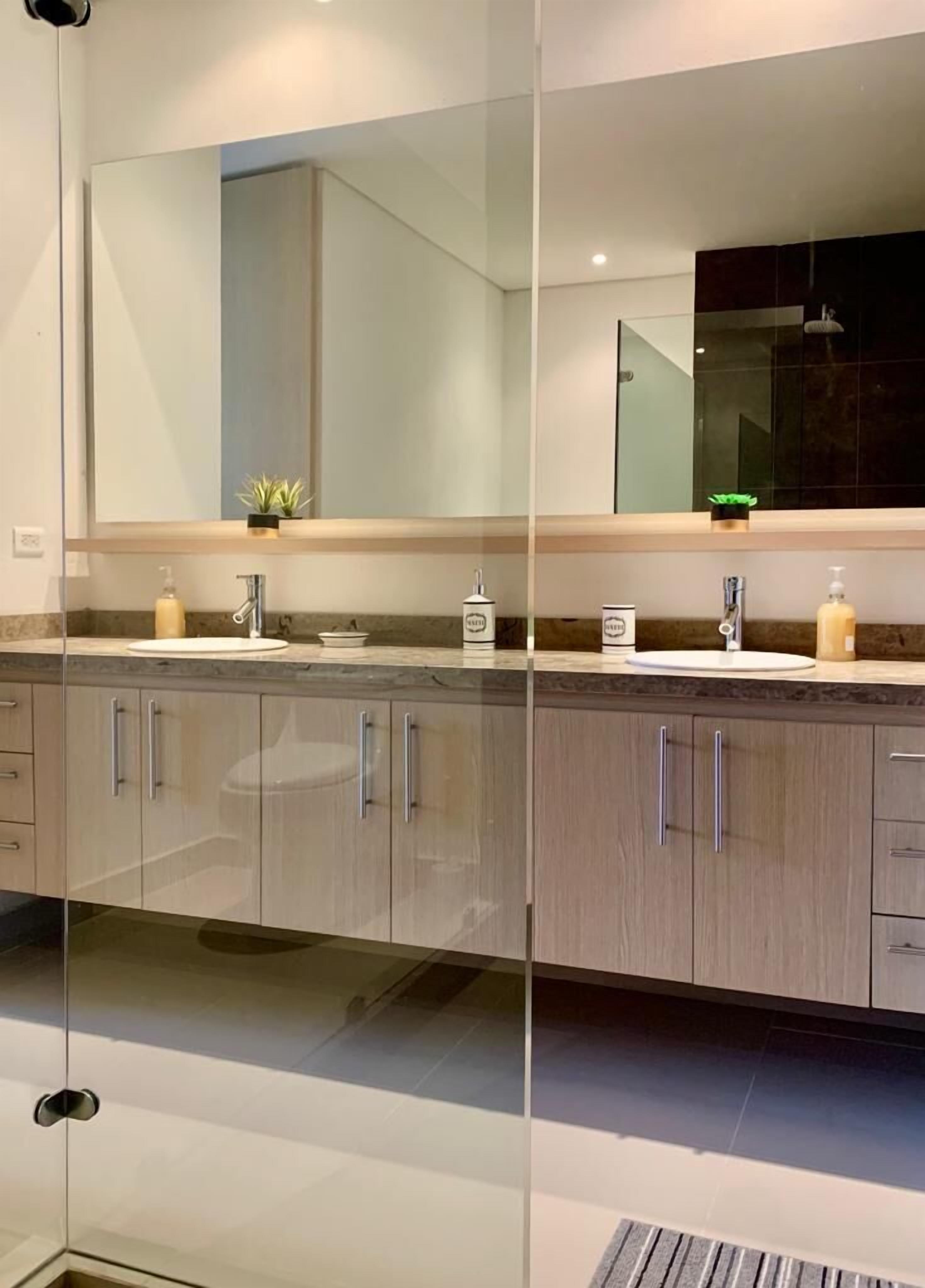 classic apartment | bathroom | shower, rainfall showerhead, towels