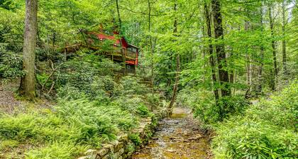 Creekside mountain cabin with firepit, deck, grill, Ping-Pong, and fireplace