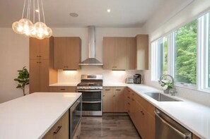 Fridge, coffee/tea maker, cookware/dishes/utensils
